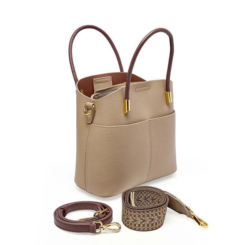 Emilia™ - Emmerbag voor dames in generfd leer met dubbel handvat