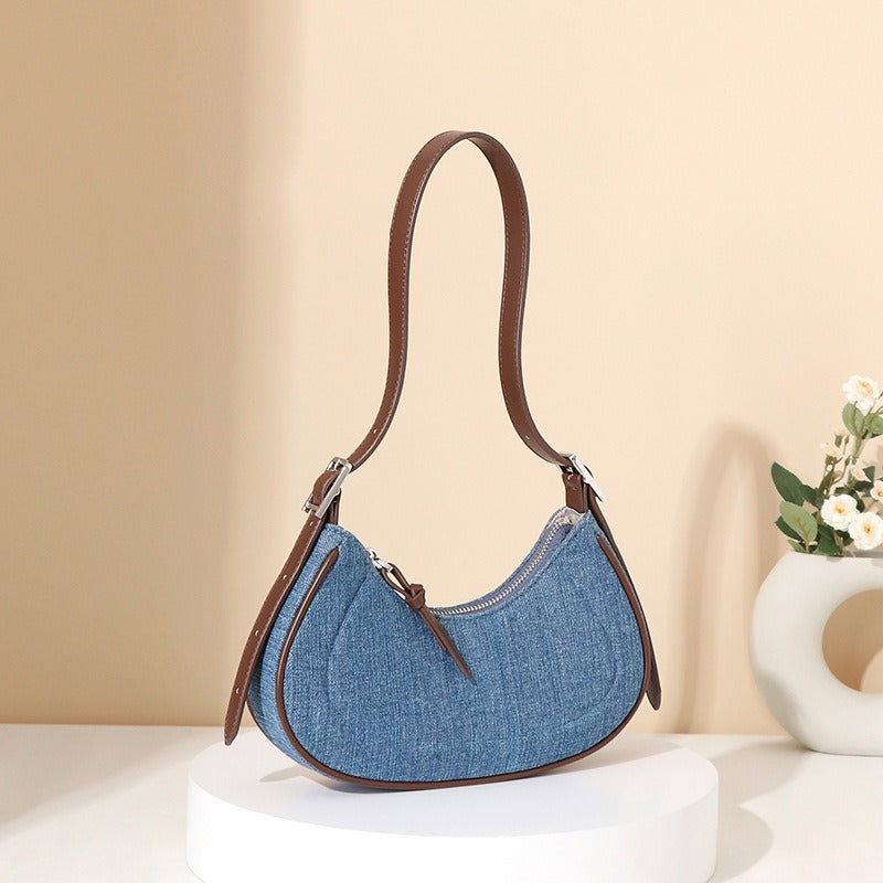 Élodie™ - Denim damesschoudertas met halvemaanvorm