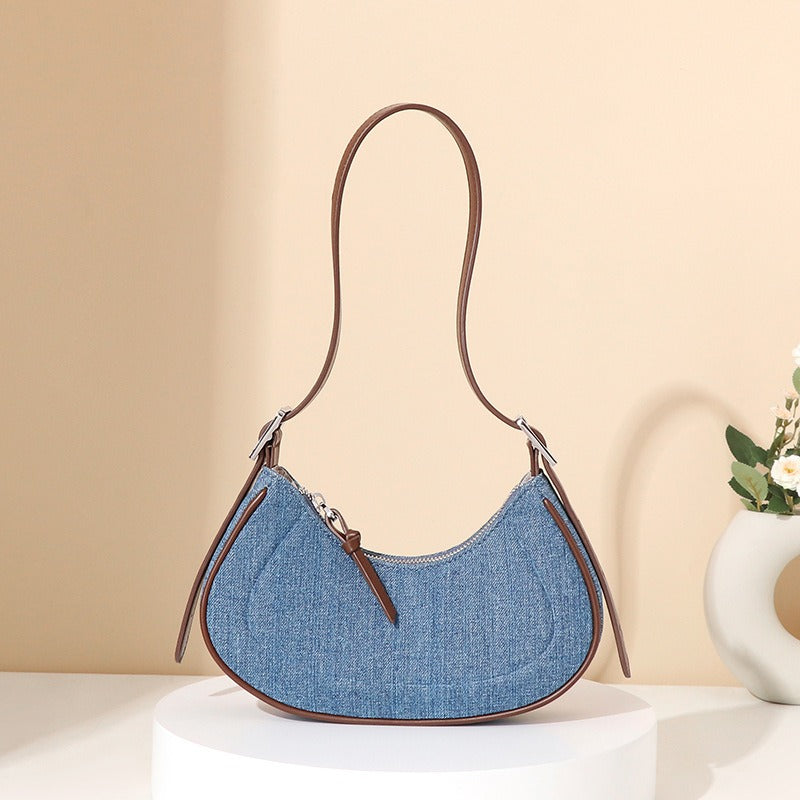 Élodie™ - Denim damesschoudertas met halvemaanvorm