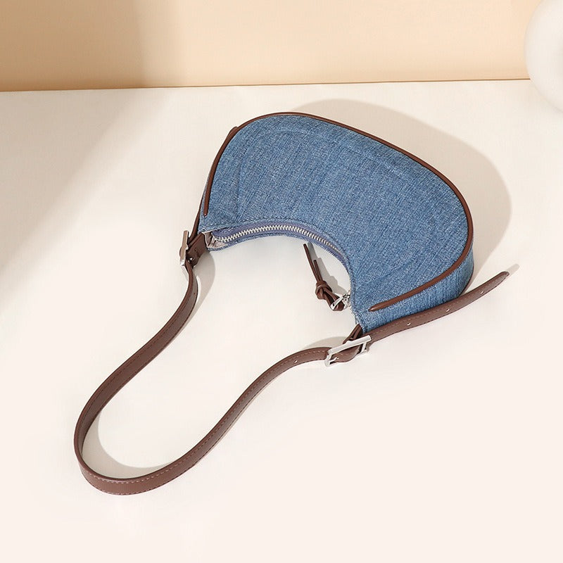 Élodie™ - Denim damesschoudertas met halvemaanvorm
